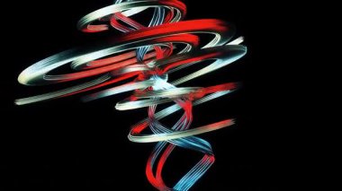 Gümüş ve kırmızı desenli metal bobinler. Boru şekilleri içe doğru kıvrılır. Bu da tünele benzer bir yapıya sahip olduğunu gösterir.