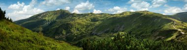 Big panoramic view on Chornohirsky ridge, tourist trails and routes to observatory on Marmarskyi Pip Ivan mountain, Carpathians, Ukraine. clipart