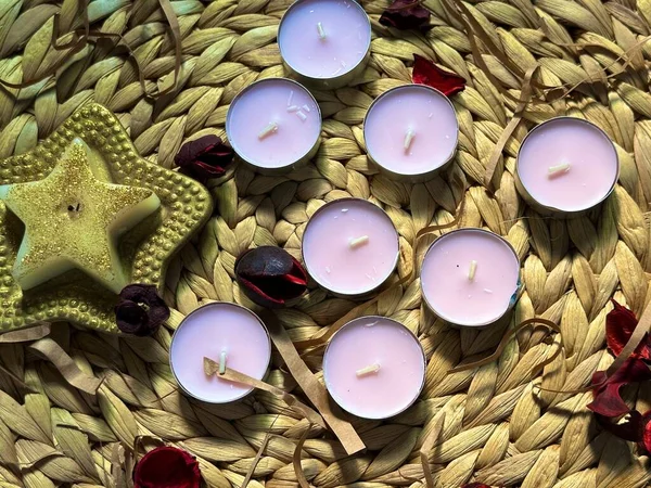 Decoration of candles and dried flowers with pleasant smells