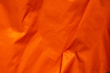 Metalik turuncu buruşuk kumaş dokusu