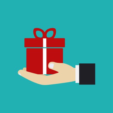 Yeşil arka planda el ele tutuşan hediye kutusu