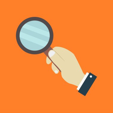 Erkek elinin yakın plan görüntüsü ve turuncu arka planda büyüteç   