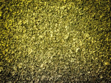 Arkaplan için sarı renkli taş dokunun yakın plan çekimi