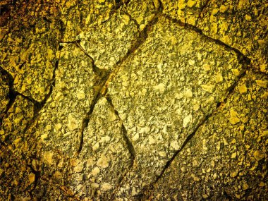 Arkaplan için sarı renkli taş dokunun yakın plan çekimi