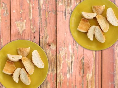 Tahta zeminde dilimlenmiş ekmek.