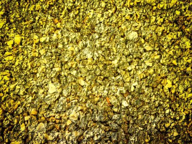 Arkaplan için sarı renkli taş dokunun yakın plan çekimi