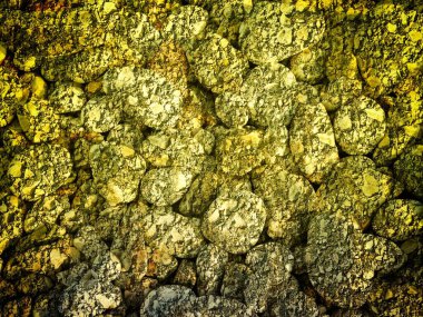 Arkaplan için sarı renkli taş dokunun yakın plan çekimi