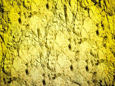 Arkaplan için sarı renkli taş dokunun yakın plan çekimi
