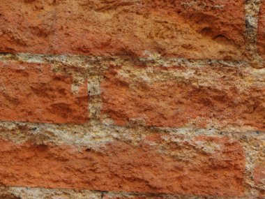 Arkaplan için tuğla duvar dokusunun yakın plan görüntüsü