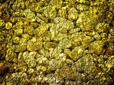 Arkaplan için sarı renkli taş dokunun yakın plan çekimi