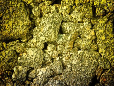 Arkaplan için sarı renkli taş dokunun yakın plan çekimi