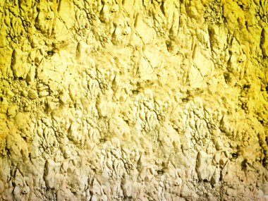 Arkaplan için sarı renkli taş dokunun yakın plan çekimi