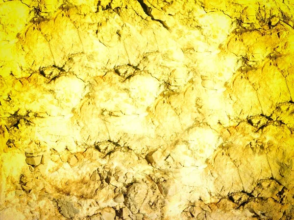 Arkaplan için sarı renkli taş dokunun yakın plan çekimi
