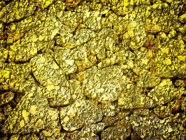 Arkaplan için sarı renkli taş dokunun yakın plan çekimi