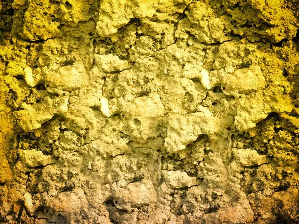 Arkaplan için sarı renkli taş dokunun yakın plan çekimi