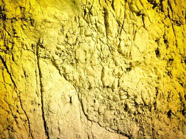 Arkaplan için sarı renkli taş dokunun yakın plan çekimi