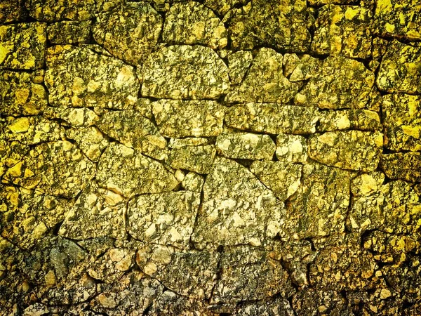 Arkaplan için sarı renkli taş dokunun yakın plan çekimi