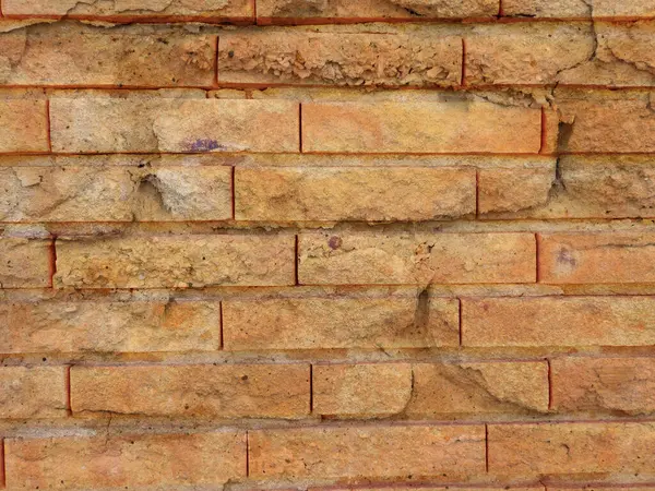 Arkaplan için tuğla duvar dokusunun yakın plan görüntüsü