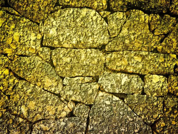 Arkaplan için sarı renkli taş dokunun yakın plan çekimi