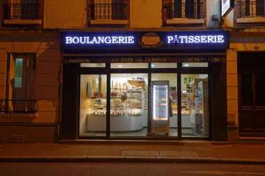 Paris, France - February 27, 2023 : Au Pain de Verdun is traditional French bakery and bread shop located in centre Suresnes at Verdun street.