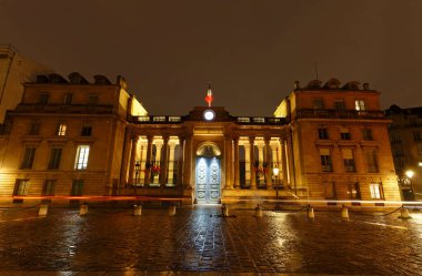 The French national Assembly-Bourbon palaceat rainy night . It the lower house of the parliament , Paris, France. The palace was built in 1722. clipart