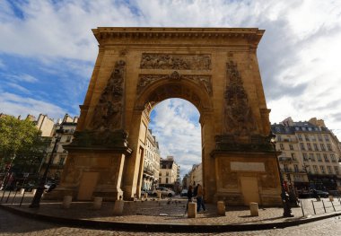 Porte Saint-Denis is a Parisian monument located in the 10th arrondissement, at the crossing of the Rue Saint-Denis continued by the Rue du Faubourg Saint-Denis. Paris. France.