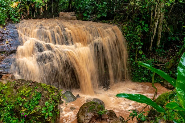 waterfall with rain water in the rain forest.