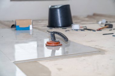 laying ceramic floor in a new building. High quality photo