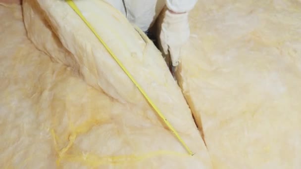 Cutting Glass Wool Insulating Ceiling Roof — Stock Video