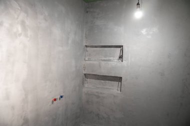 room with plastered walls on the construction site. High quality photo