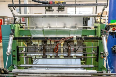 mechanically machine for the production of plastic bags. 