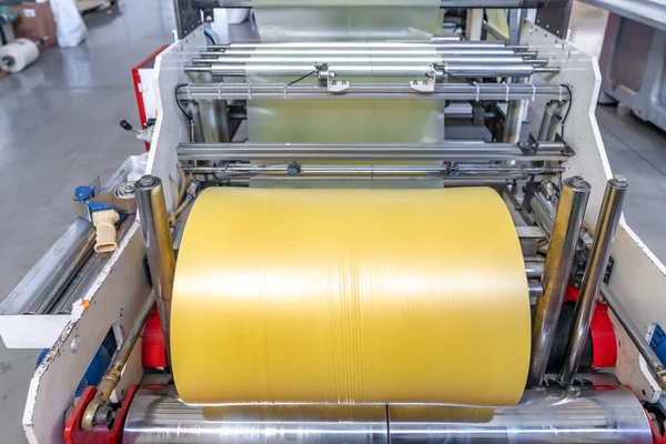 plastic roll on the machine for the production of plastic bags.