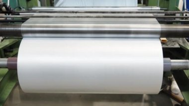 plastic roll on the machine for the production of plastic bags. 