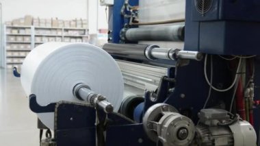 plastic roll on the machine for the production of plastic bags. 