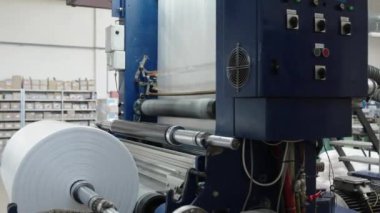 large plastic roll in the factory for the production of plastic packaging material and bags. 