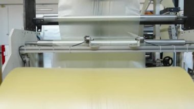 large plastic roll in the factory for the production of plastic packaging material and bags. 