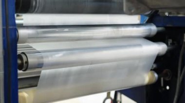 production of plastic packaging in a factory on an automated line. 
