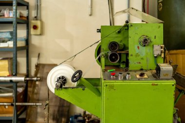 mechanical machine for trimming plastic casings for the food industry. High quality photo