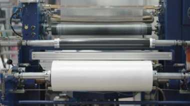 production of plastic packaging in a factory on an automated line. 