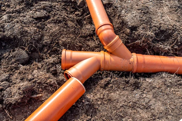 plastic waste pipes in the ground.