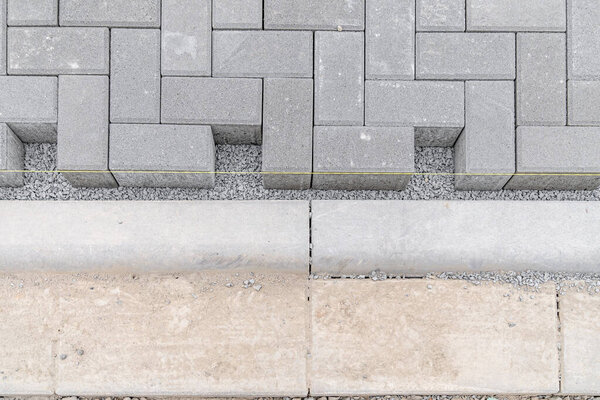 Concrete blocks for the construction of sidewalks and roads.
