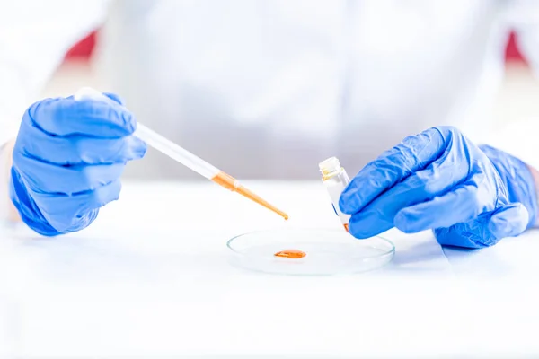 stock image test of a chemical sample in the scientific laboratory of the research institute. 