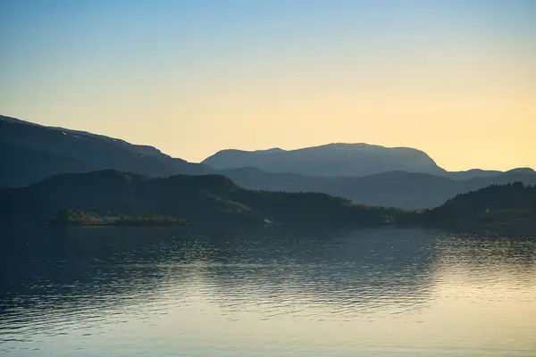 Stock image Fjord with view of mountains and fjord landscape in Norway. Landscape shot in the evening in the north at sunset