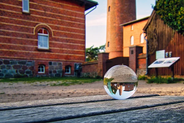 Seeing through with the glass ball. The world viewed through the glass ball. Other perspectives on the Baltic Sea in Zingst. In a beautiful light mood
