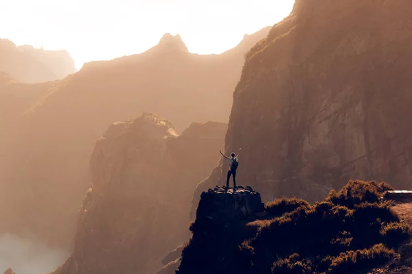 stock image Pico do Arieiro is the third highest peak on Madeira Island and is one of the most popular sunrise spots.,a view from a drone of a landscape shrouded in clouds