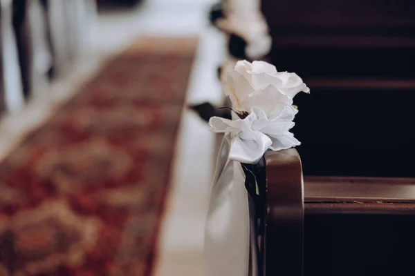 shot of the wedding decoration in the church, white flowers