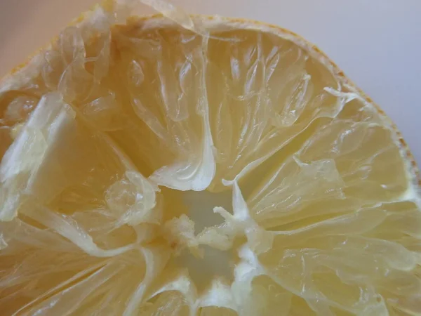 detail of yellow sour lemon on slice