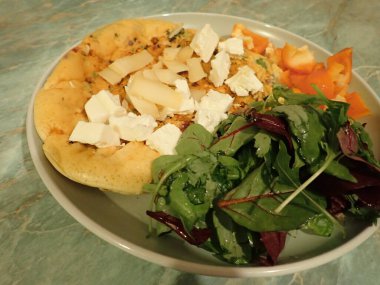 portion of egg omelette served on a plate