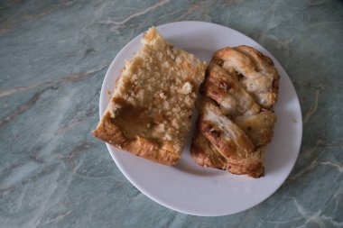 fresh sweet bakery cake on a white plate