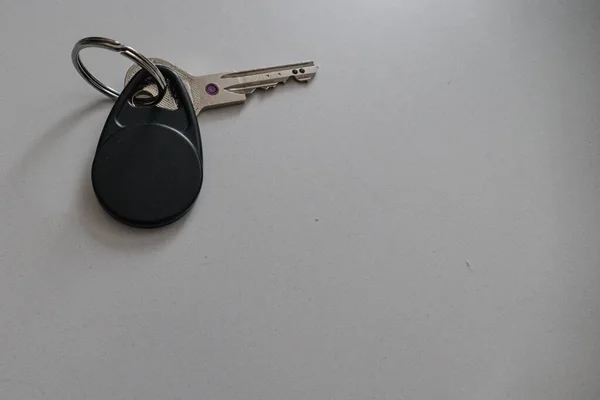 home key from a flat with a chip on a ring